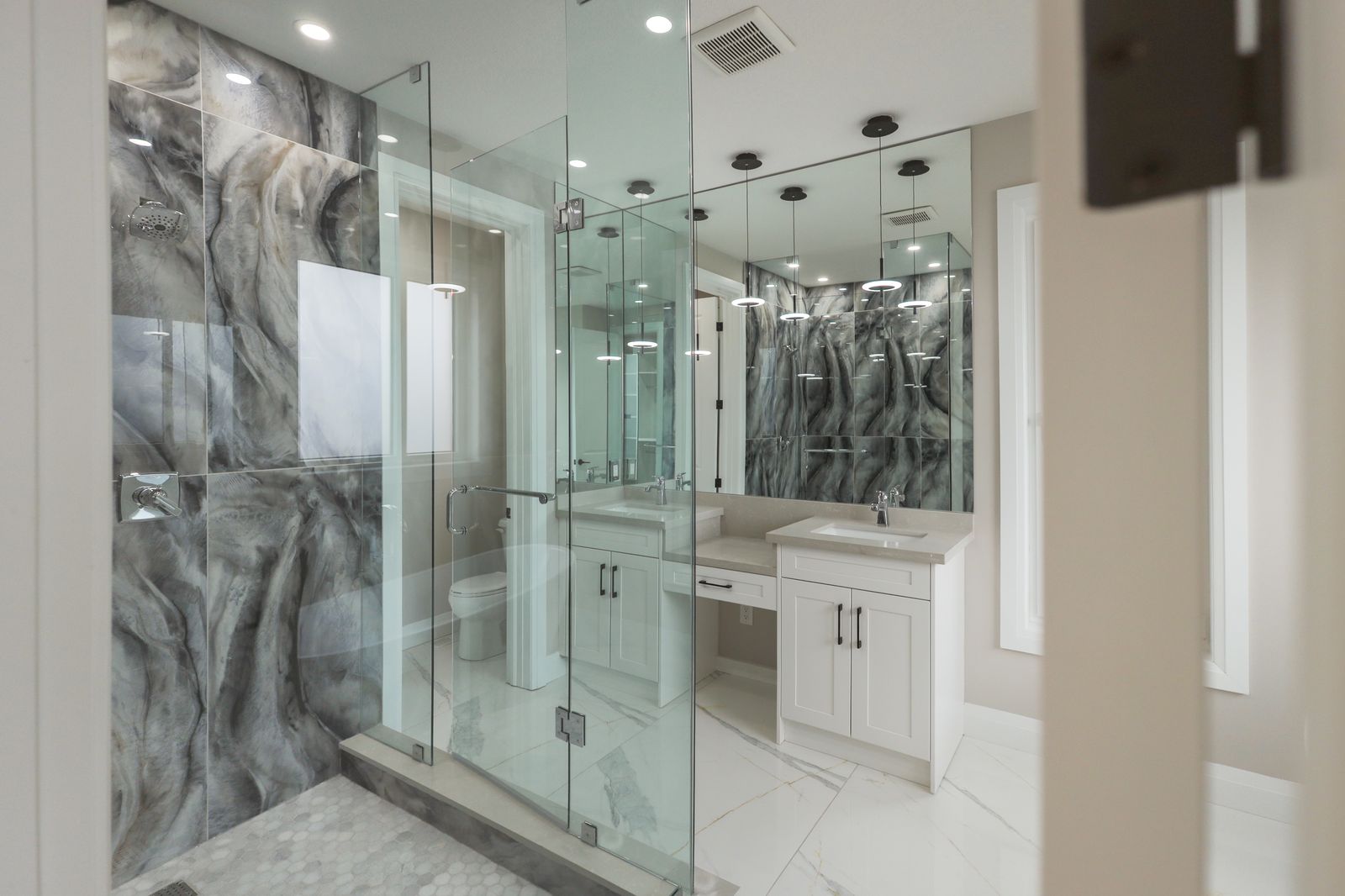 Spa ensuite with walk-in shower in a completed Carnaby home