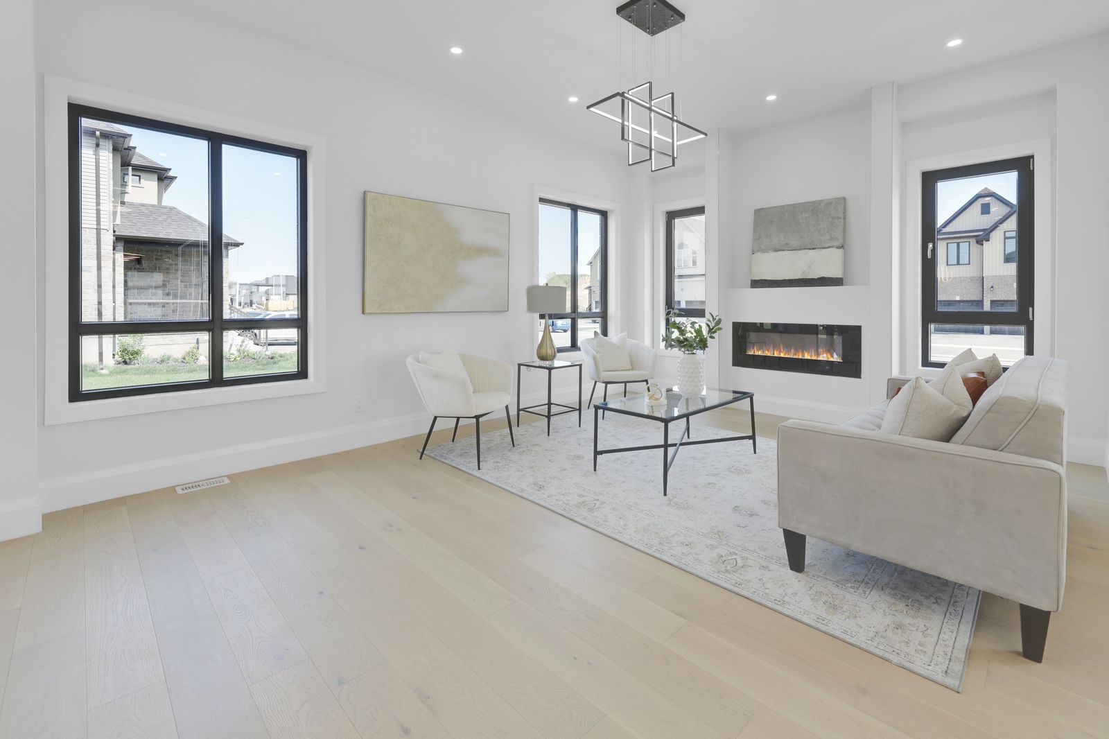 Sitting room with fireplace in a completed Carnaby home