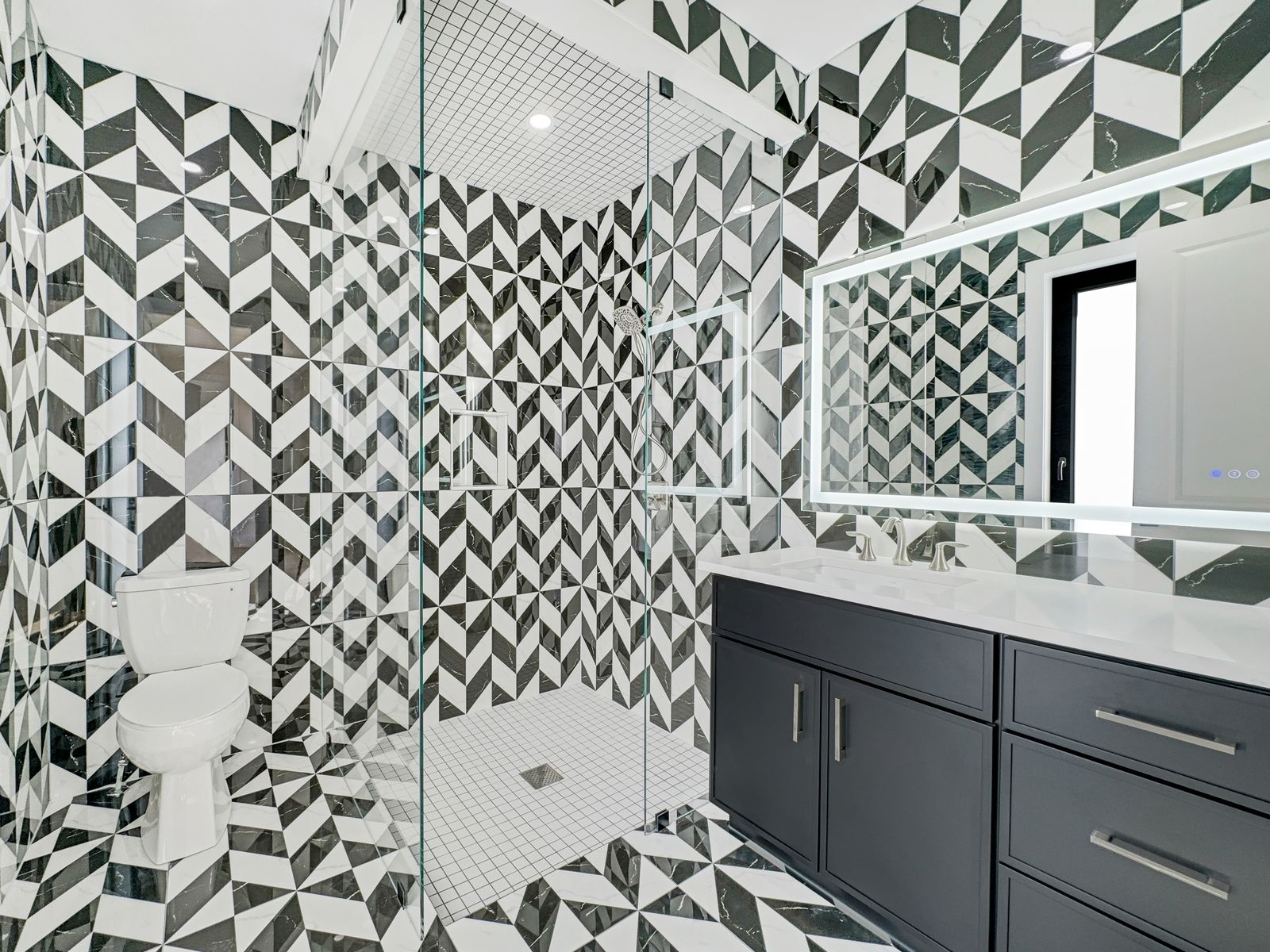 Statement tile in a shower in a completed Carnaby home