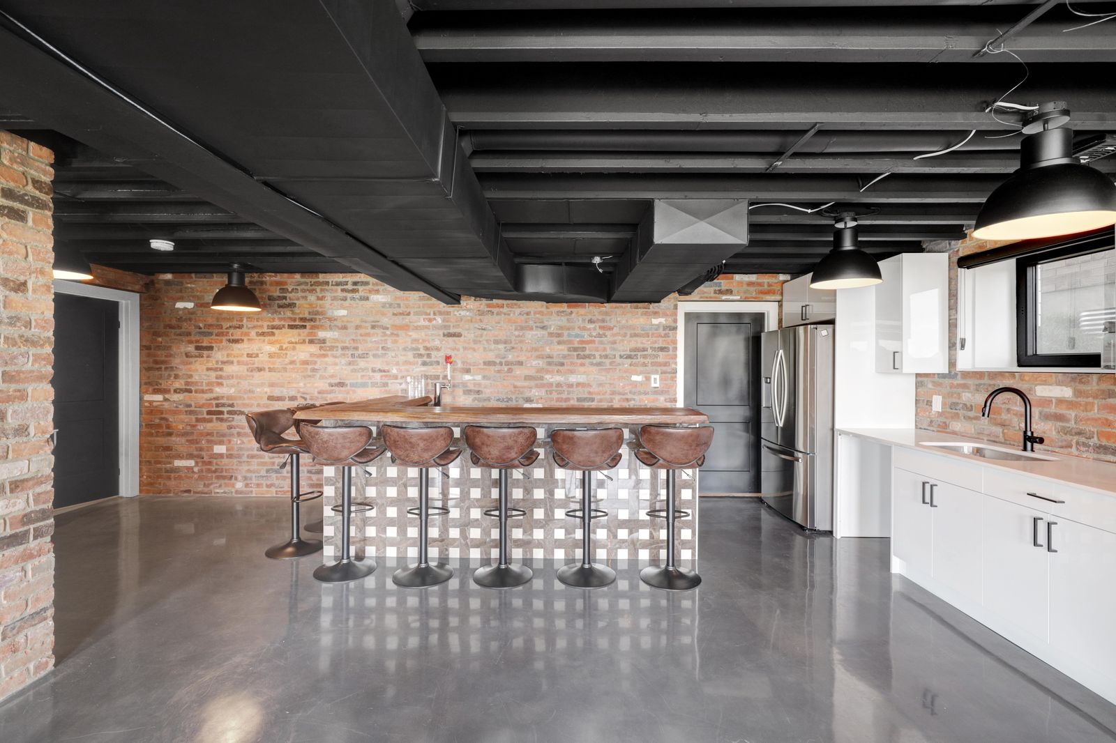 Finished lower-level bar in a completed Carnaby home